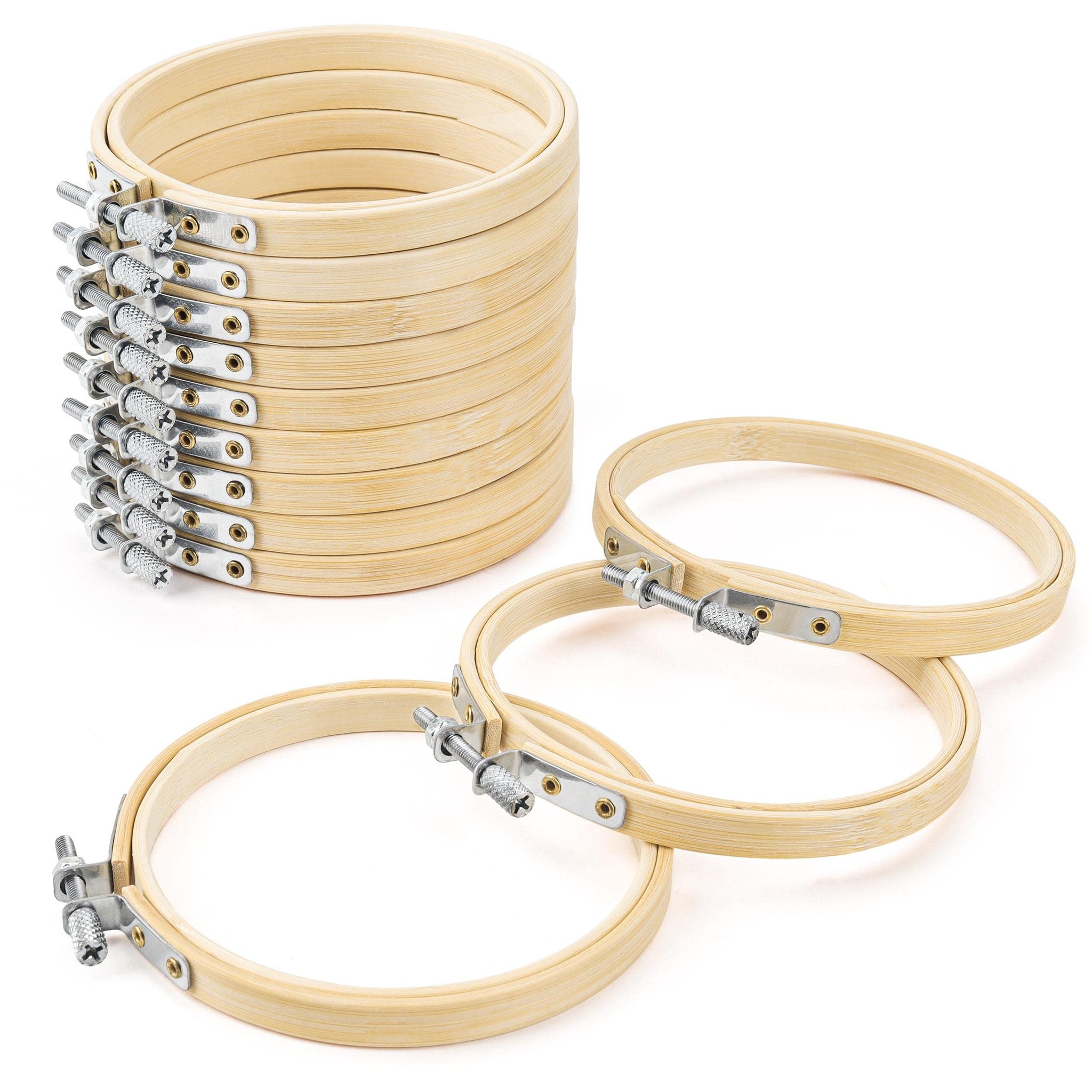 Stack of 12 bamboo embroidery hoops and three individual hoops on a white background