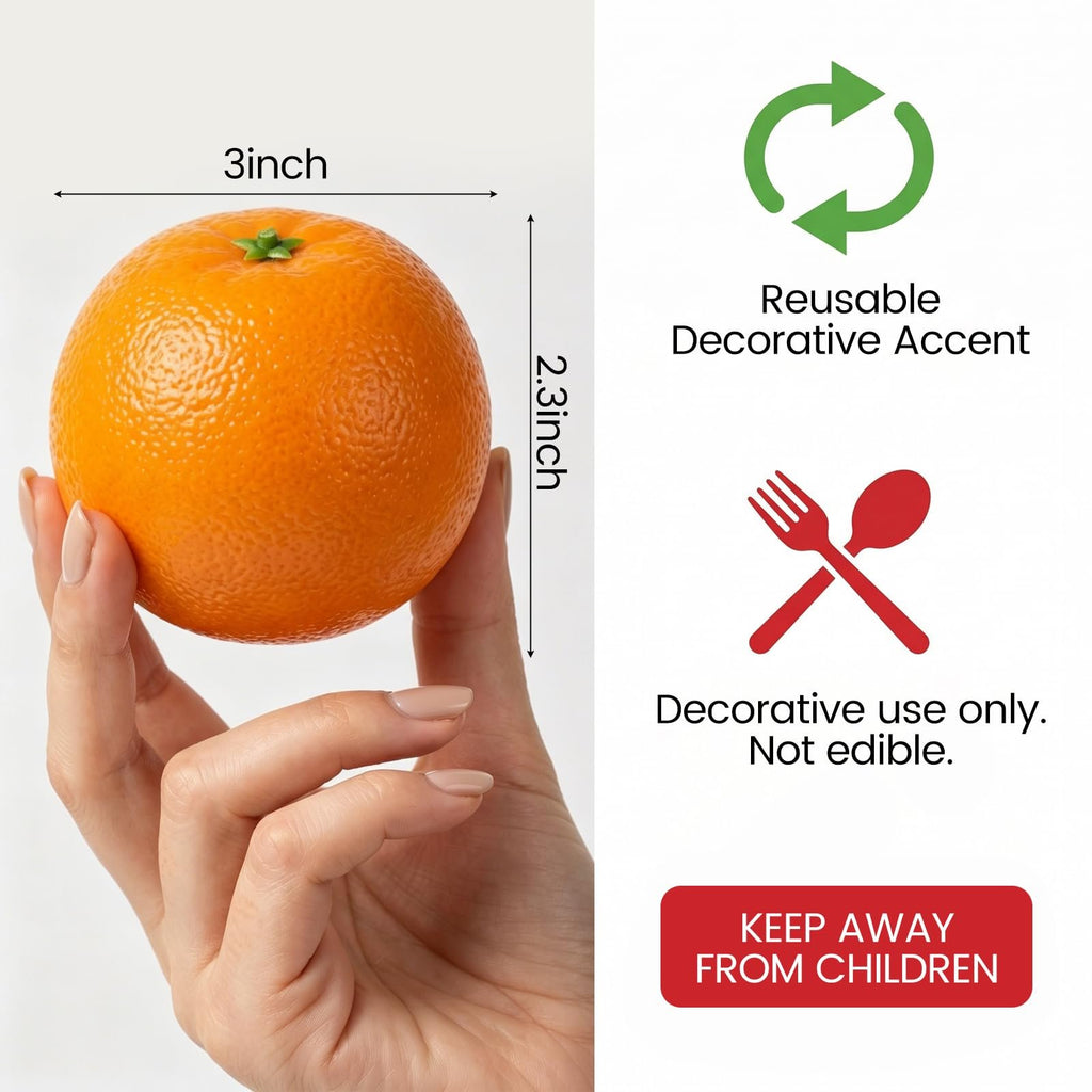 Hand holding a lifelike artificial orange with dimensions labeled 3 inches by 2.3 inches.