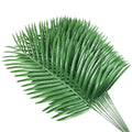 Bunch of 12 artificial green palm leaves fanned out against a white background, viewed from a slight angle.
