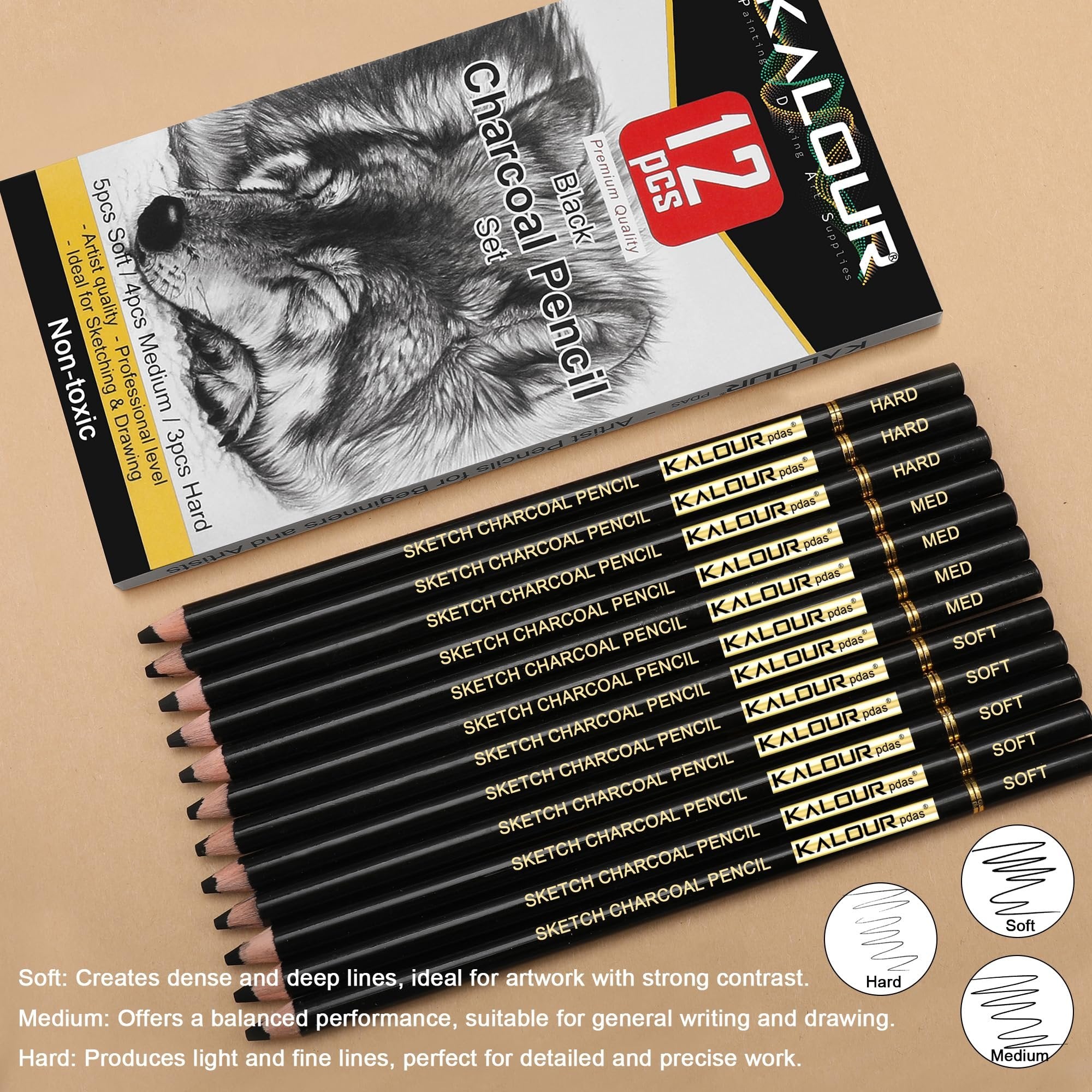 12-piece charcoal pencil drawing set with soft, medium, and hard leads, laid out with packaging showing a wolf sketch.