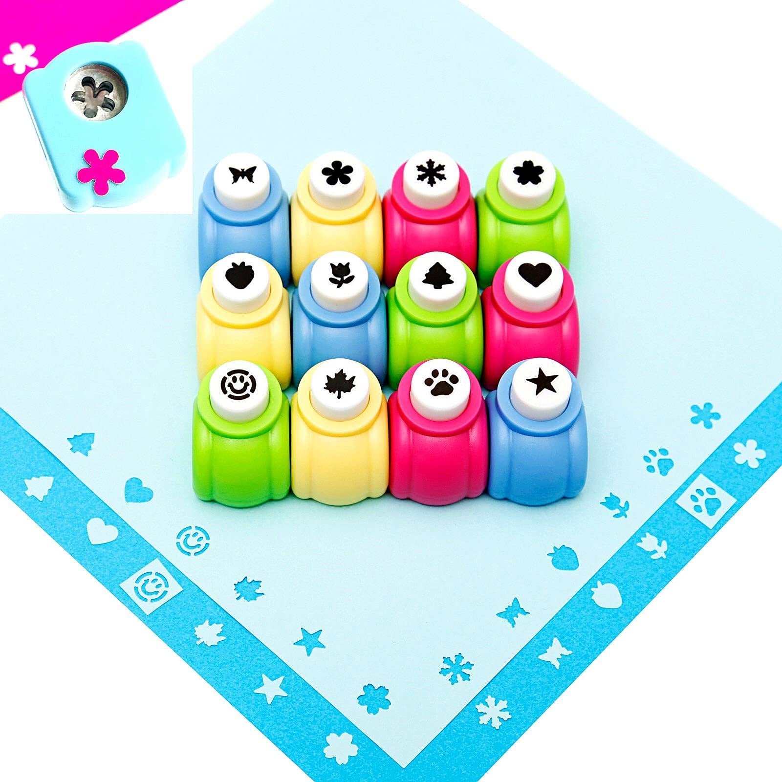 Set of 12 mini craft hole punches with assorted shapes on a light blue paper background