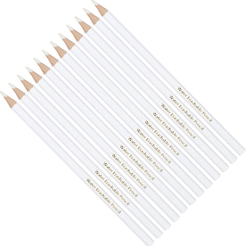 A dozen white water-erasable pencils arranged diagonally on a white background, showing their sharpened tips.