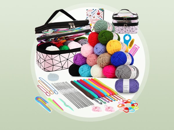 Crochet hook set with yarn balls and storage bags, featuring animal print handles on hooks.