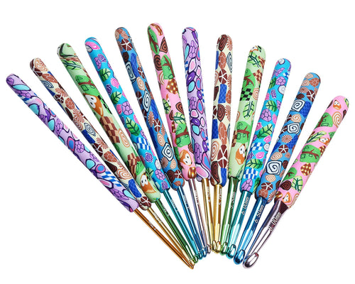 Set of 12 crochet hooks with colorful animal print clay handles, displayed fanned out against a white background.