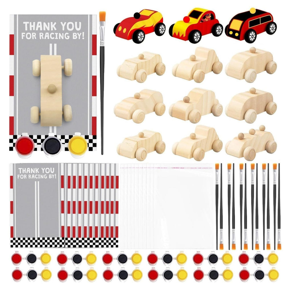Unfinished wooden race car painting kit contents including cars, paints, brushes, and thank you cards.