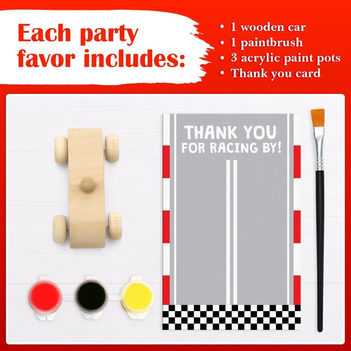 Unfinished wooden race car painting kit contents including a wooden car, paint pots, paintbrush, and thank you card.