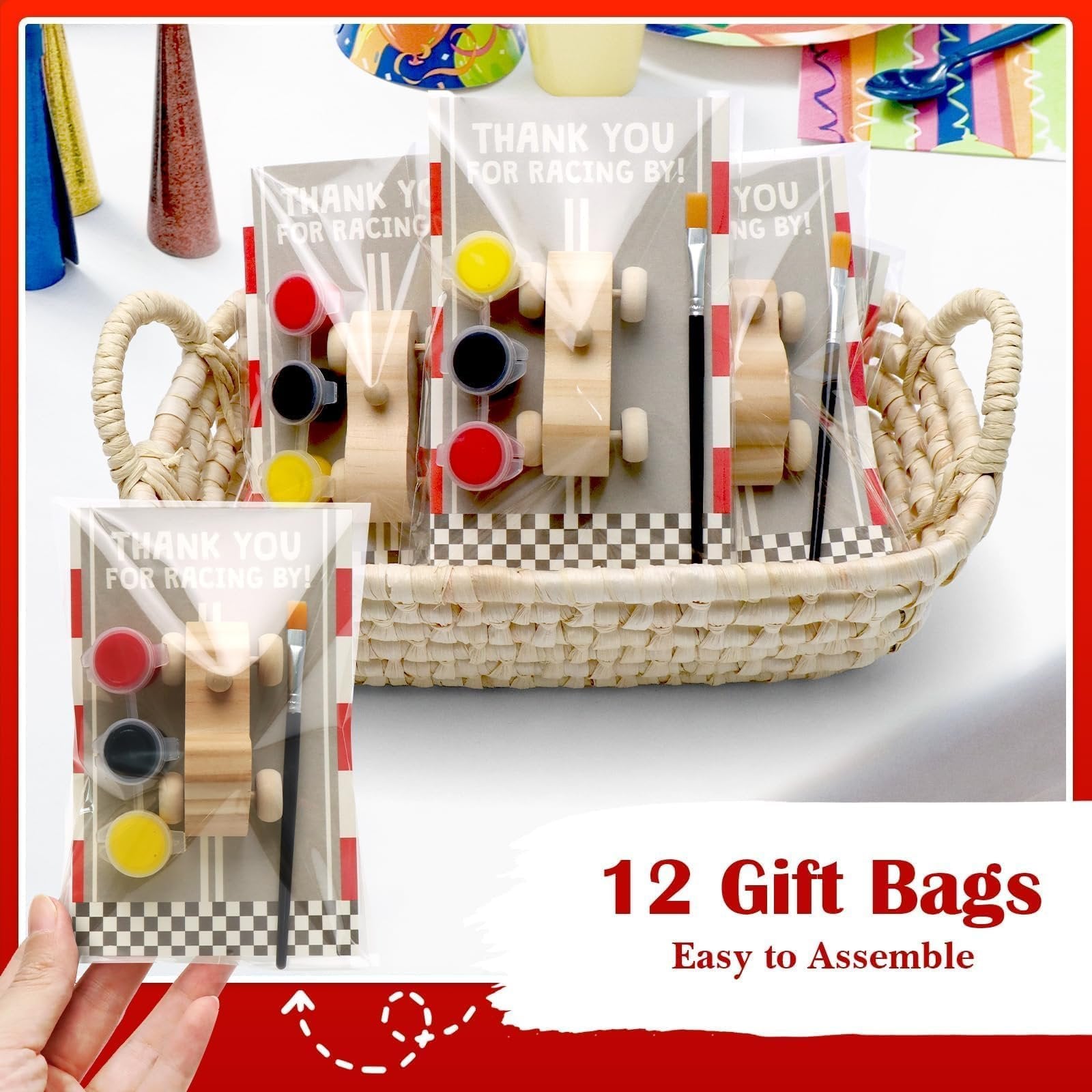 Unfinished wooden race car painting kits in gift bags with paints and brushes in a basket.