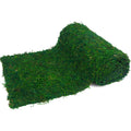 Roll of preserved green moss for crafts and decor, shown from an angle on a white background.