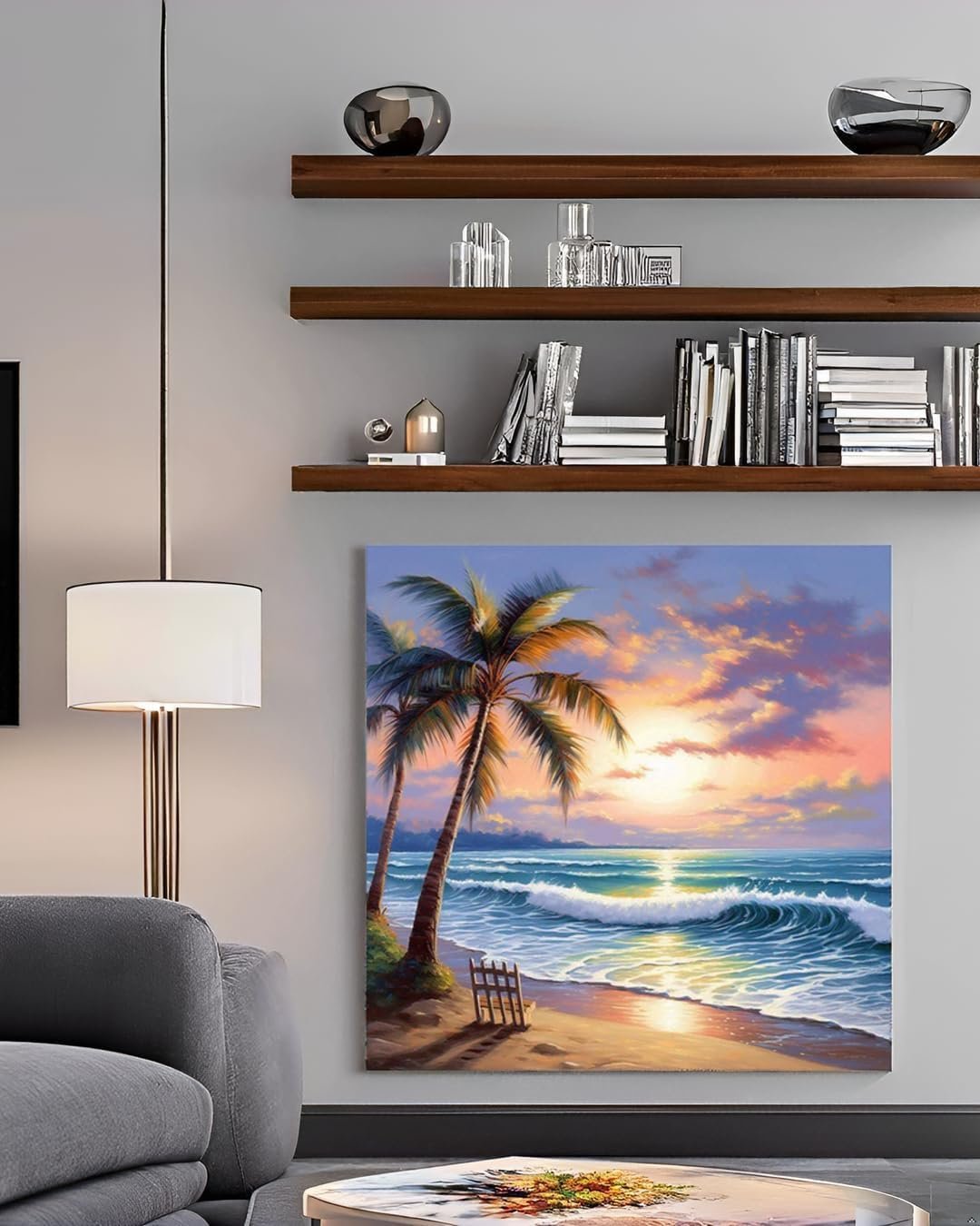 Diamond painting kit of a tropical beach sunset with palm trees and ocean waves, displayed on a wall.