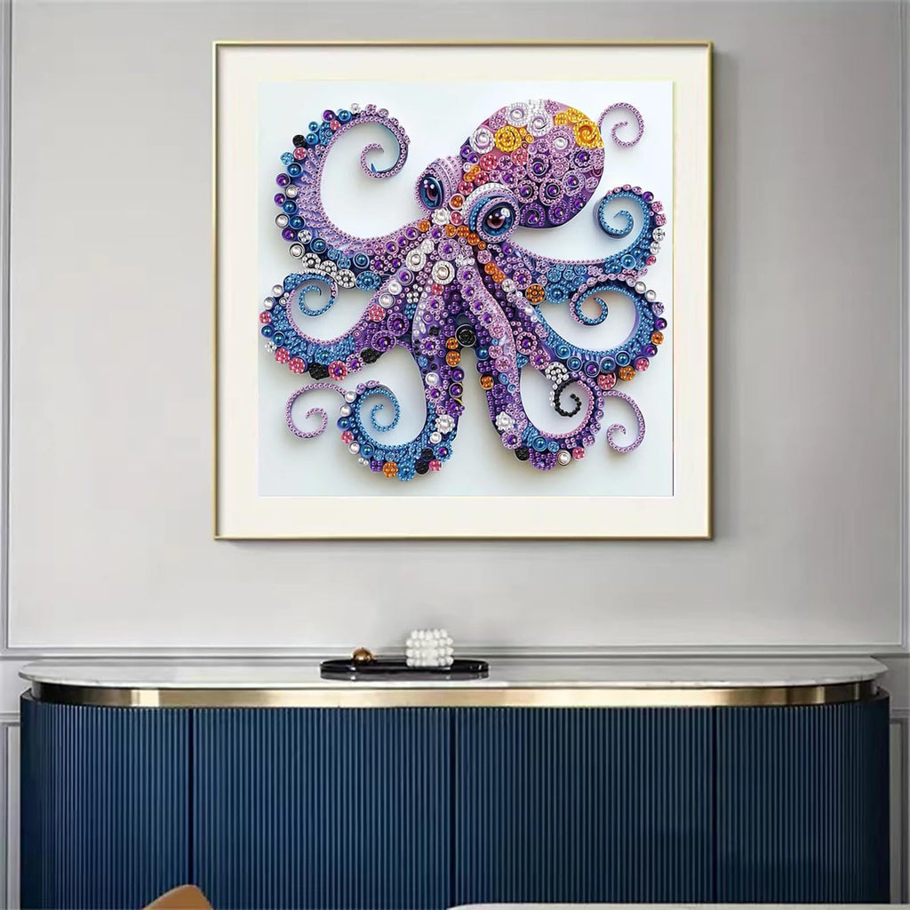 Framed 5D purple octopus diamond painting kit with crystal rhinestones displayed on a wall above a blue cabinet.