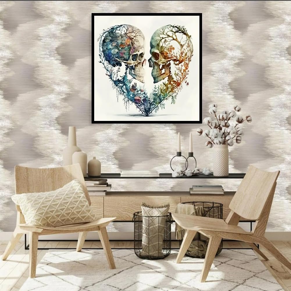 Heart-shaped floral skull art hanging on a wall above a console table with chairs in foreground