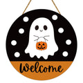 Round Halloween welcome sign featuring a ghost holding a jack-o'-lantern and the word 'Welcome' in orange.