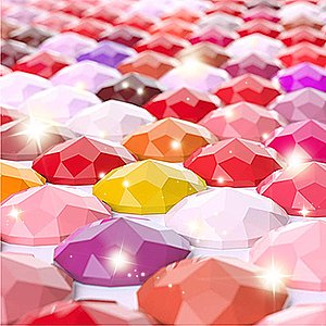 Close-up of colorful round diamond painting drills in shades of pink, red, purple, and yellow, with sparkling highlights.