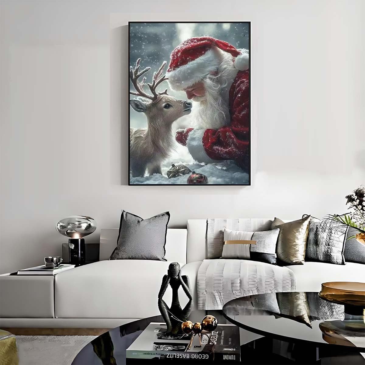 Christmas diamond painting of Santa Claus and a reindeer in the snow, framed and hung above a sofa.