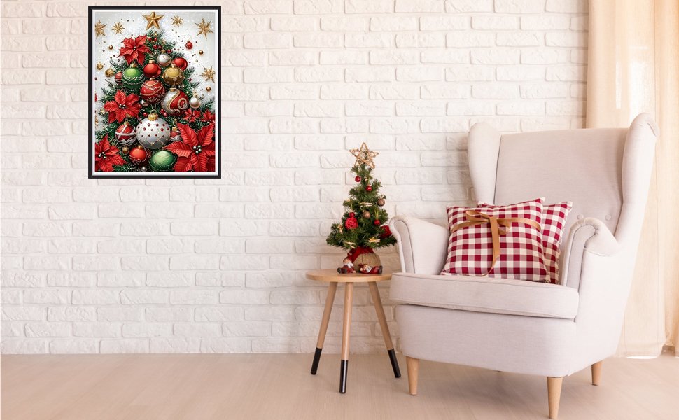 Diamond painting of a Christmas tree with ornaments and poinsettias, displayed in a living room setting with a chair and side table.