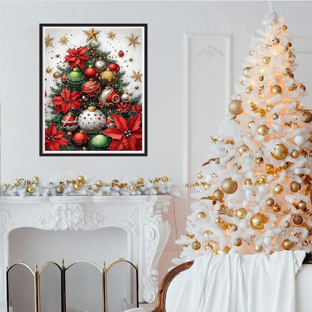 Framed diamond painting of a Christmas tree with red poinsettias and gold ornaments, displayed above a white fireplace with a white Christmas tree decorated with gold ornaments.