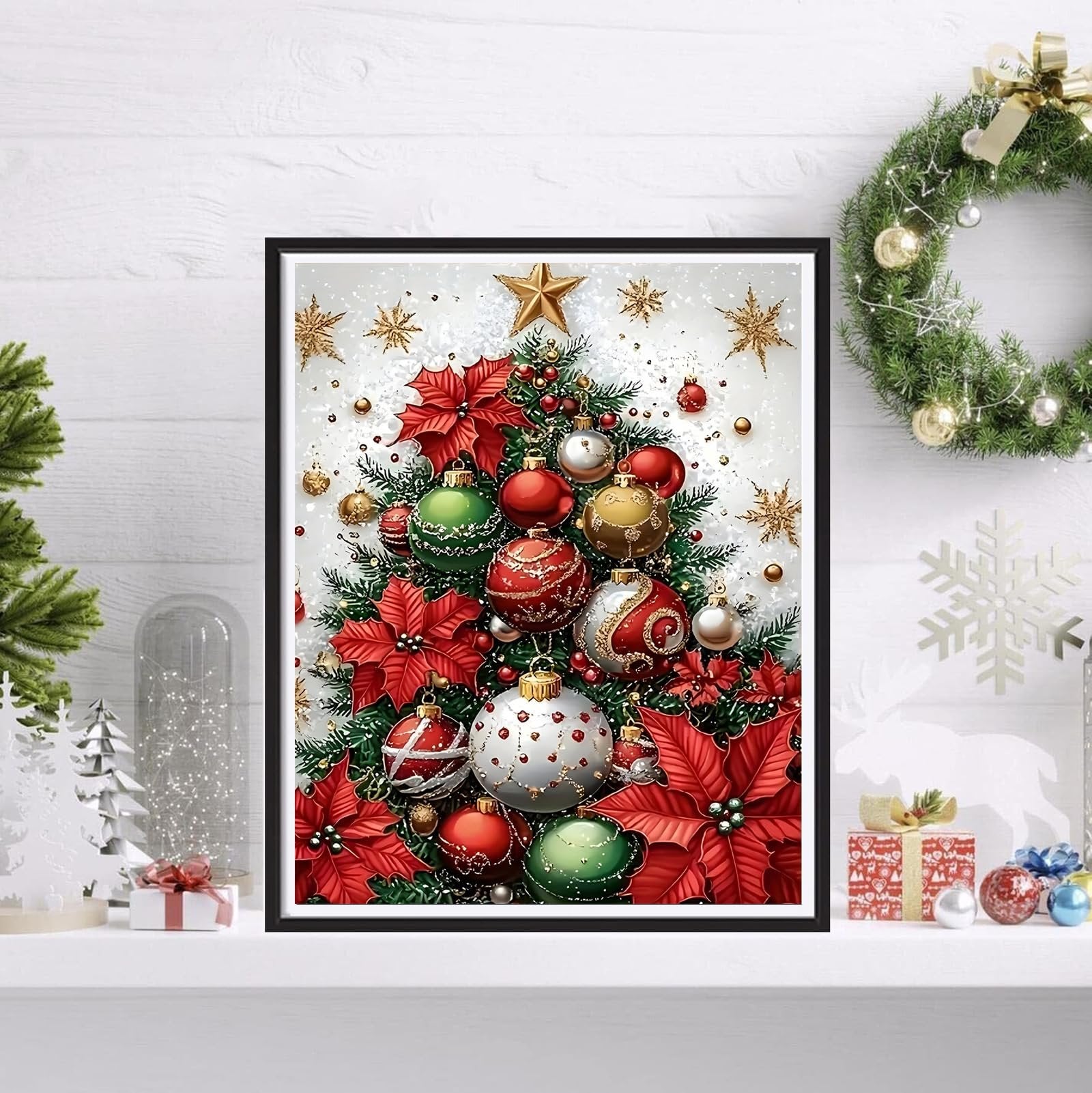 Framed Christmas tree diamond painting with red poinsettias and ornaments, displayed on a shelf with a wreath.