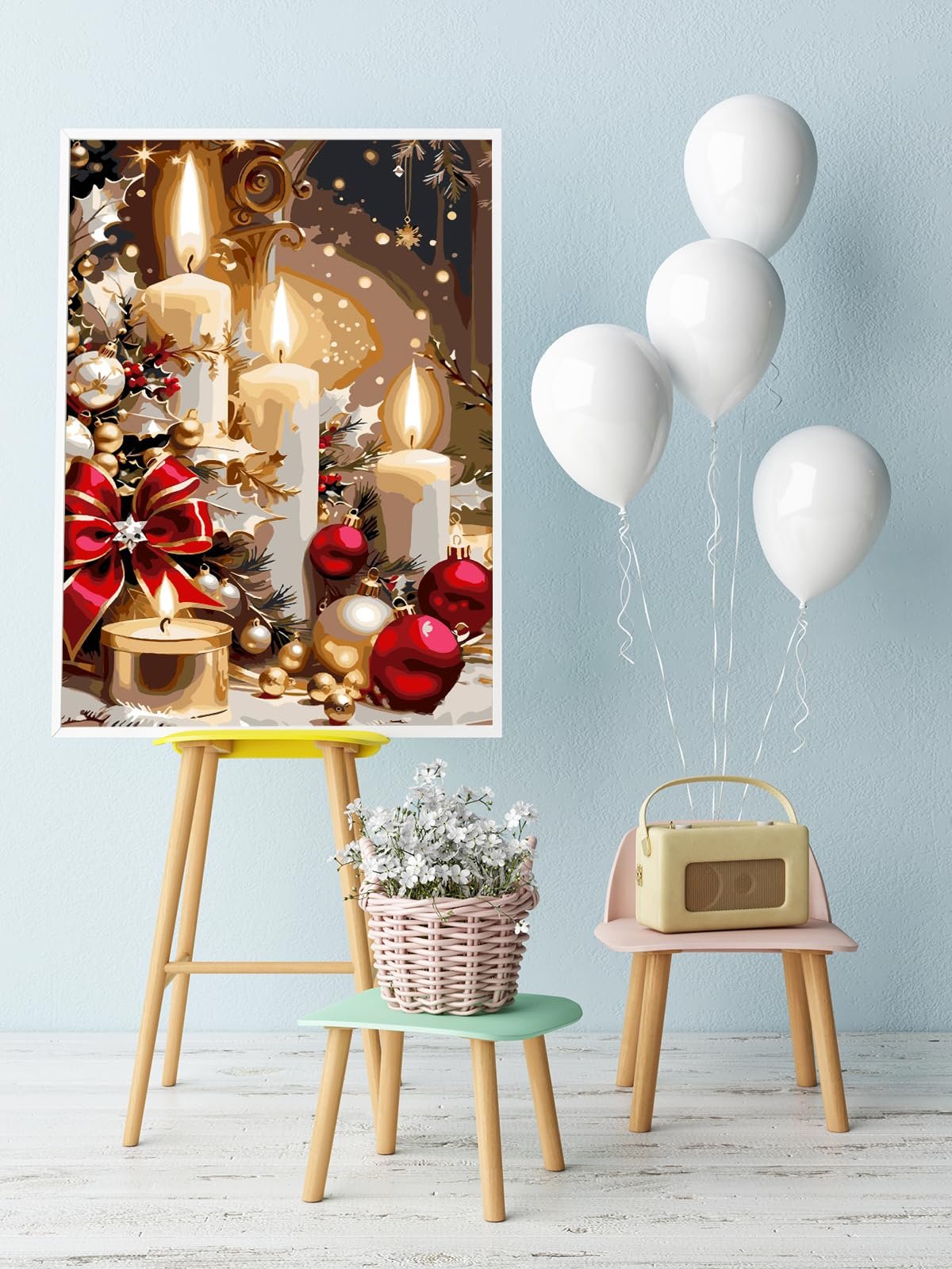 Paint-by-numbers kit showing lit Christmas candles, ornaments, and a red bow on a table with balloons and a basket of flowers nearby.