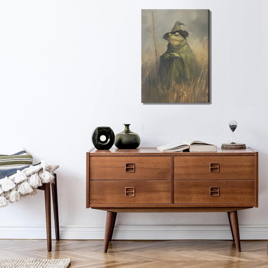 Canvas print of a frog wearing a witch hat and cloak, standing in tall grass.