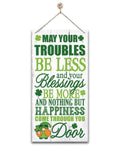Hanging wooden sign with Saint Patrick's Day Irish prayer and gnome graphic.