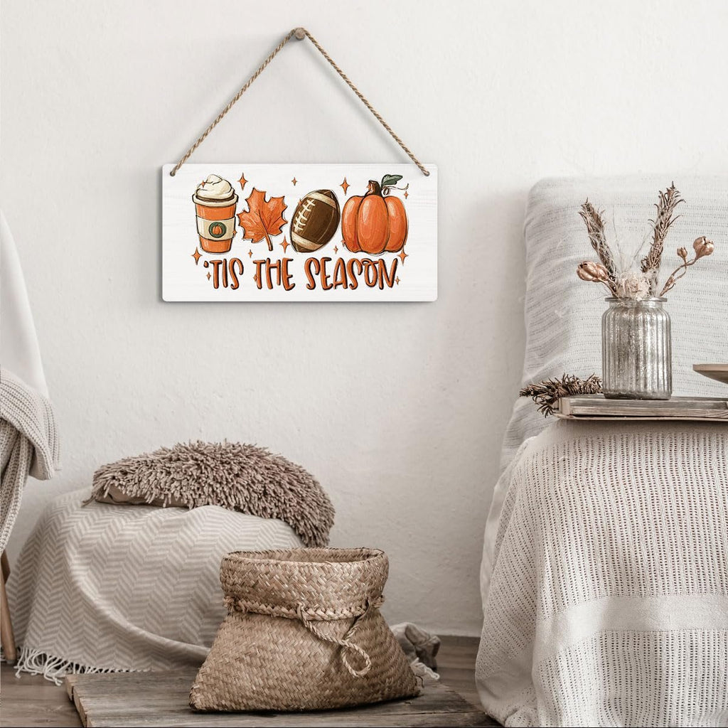 Wooden fall hanging sign with coffee cup, maple leaf, football, and pumpkin, reads 'Tis the Season.