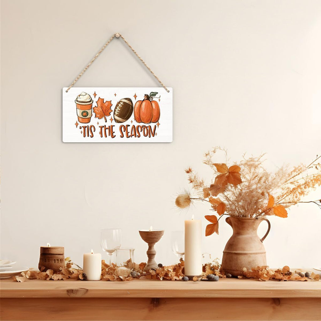 Wooden fall hanging sign with coffee cup, football, pumpkin, and maple leaf graphics, reads 'Tis the Season'