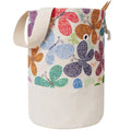 Canvas knitting and crochet storage organizer bag with colorful butterfly pattern and beige handles.