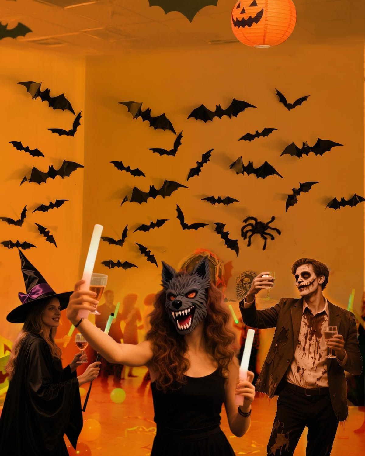 Halloween party scene with people in costumes and black bat decorations on the wall.