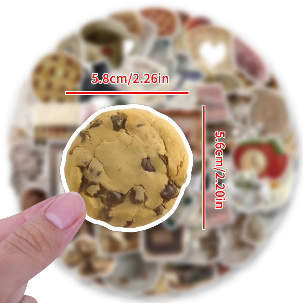Hand holding a chocolate chip cookie sticker, with dimensions 5.8cm/2.26in and 5.6cm/2.20in overlaid on a background of various aesthetic stickers.