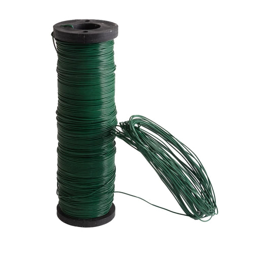 Spool of dark green paddle wire with loose wire strands extending to the right.
