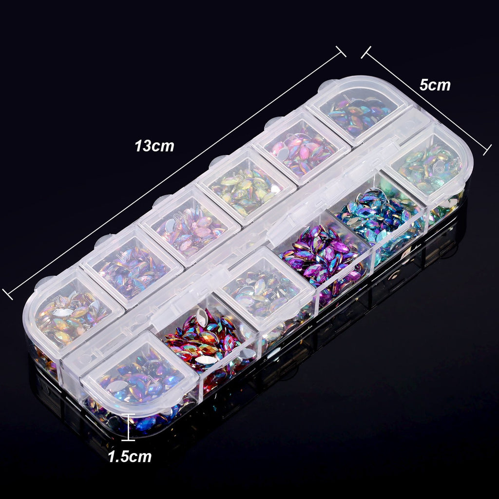Set of horse eye nail rhinestones in a clear divided storage box, showing 12 compartments with colorful gems.