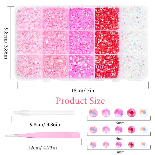 Flatback resin rhinestones in pink and red shades, organized in a clear compartment case, with included tools and size indicators.
