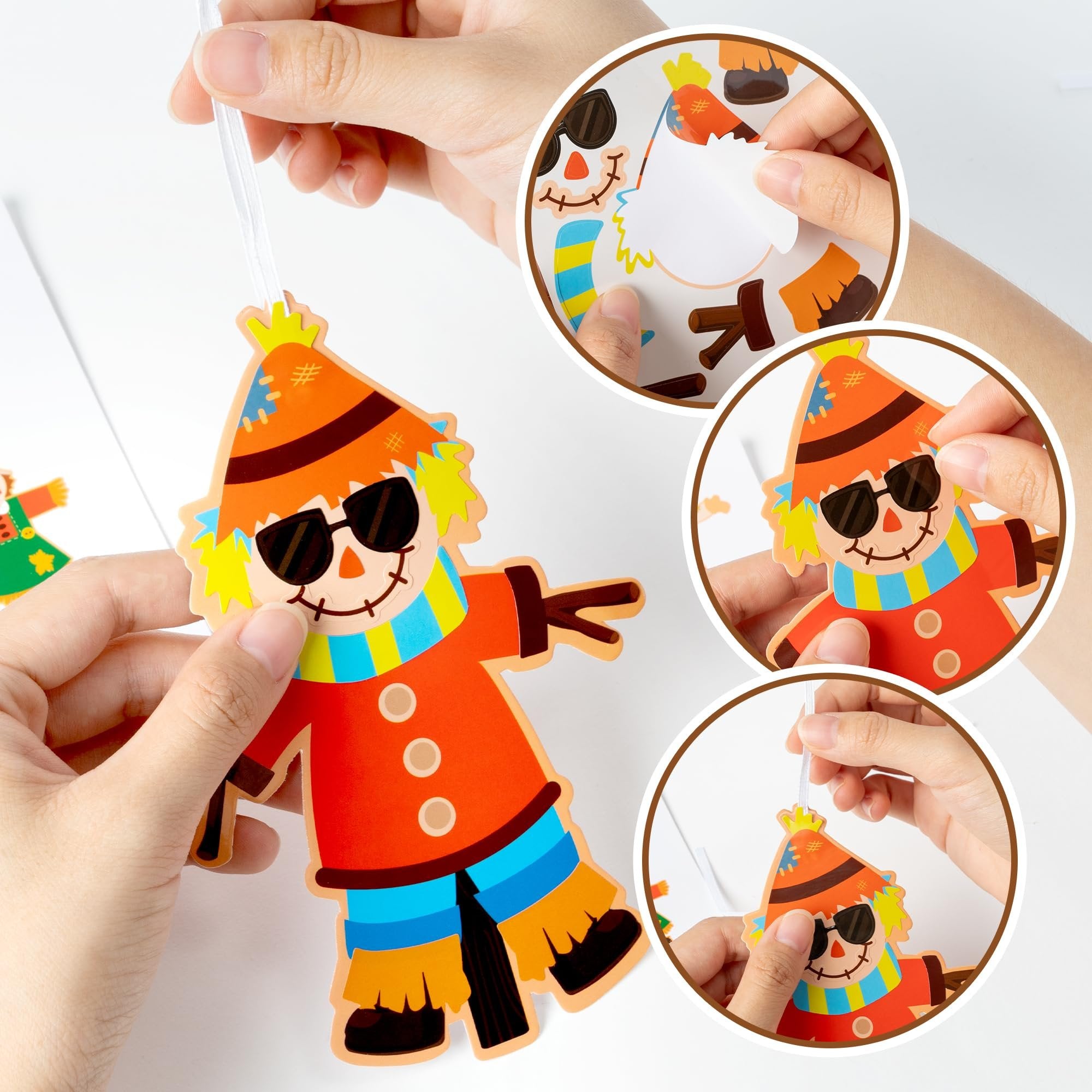 Hands assembling a scarecrow craft kit, applying stickers to a scarecrow cutout. Multiple close-up insets show the process.
