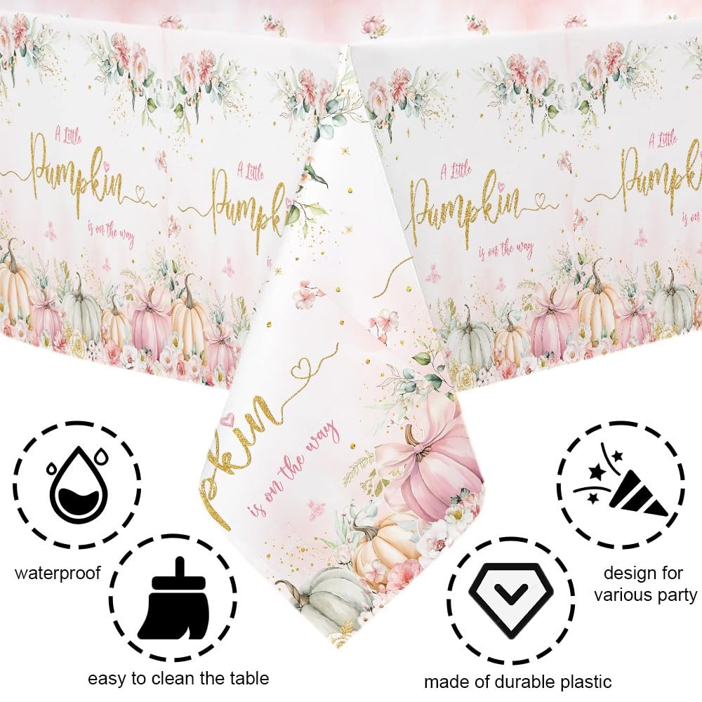 Pink pumpkin baby shower tablecloth with floral accents and text 'A Little Pumpkin is on the way'.