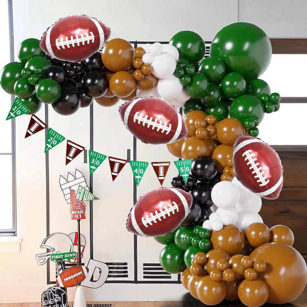 Football-themed balloon arch garland kit with football foil balloons, pennant banners, and party props.