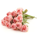 Bunch of 12 pink artificial roses with green stems and leaves, displayed on a white background.