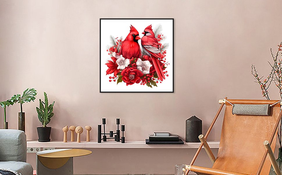 12x12 inch 5D cardinal diamond painting kit with round full drill, featuring two red cardinals surrounded by red and white flowers and berries, displayed on a wall in a living room setting.