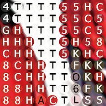 Close-up of a grid of letters and numbers on a red and white background, abstract pattern.