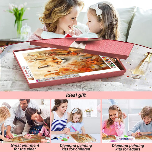 Diamond painting kit with fox and fall leaves design, shown in gift box with family doing crafts below.