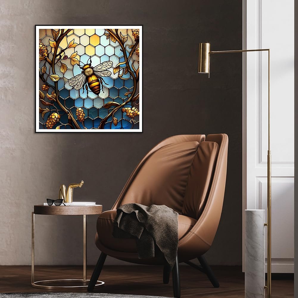 Diamond painting kit featuring a stained glass bee on a honeycomb background, displayed in a modern living room setting.