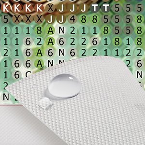 Diamond painting kit canvas with color-coded grid and water droplets, close-up view.
