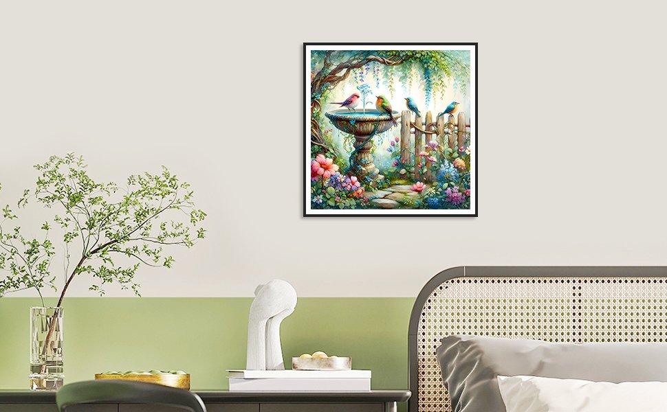 Framed 5D diamond painting kit featuring a bird bath and fence in a garden setting.