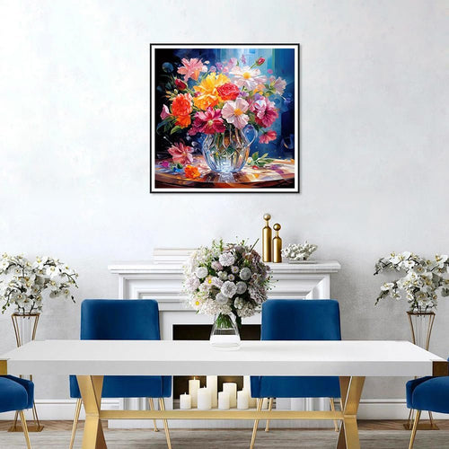 Diamond painting of a colorful flower bouquet in a crystal vase on a table, displayed in a dining room setting.