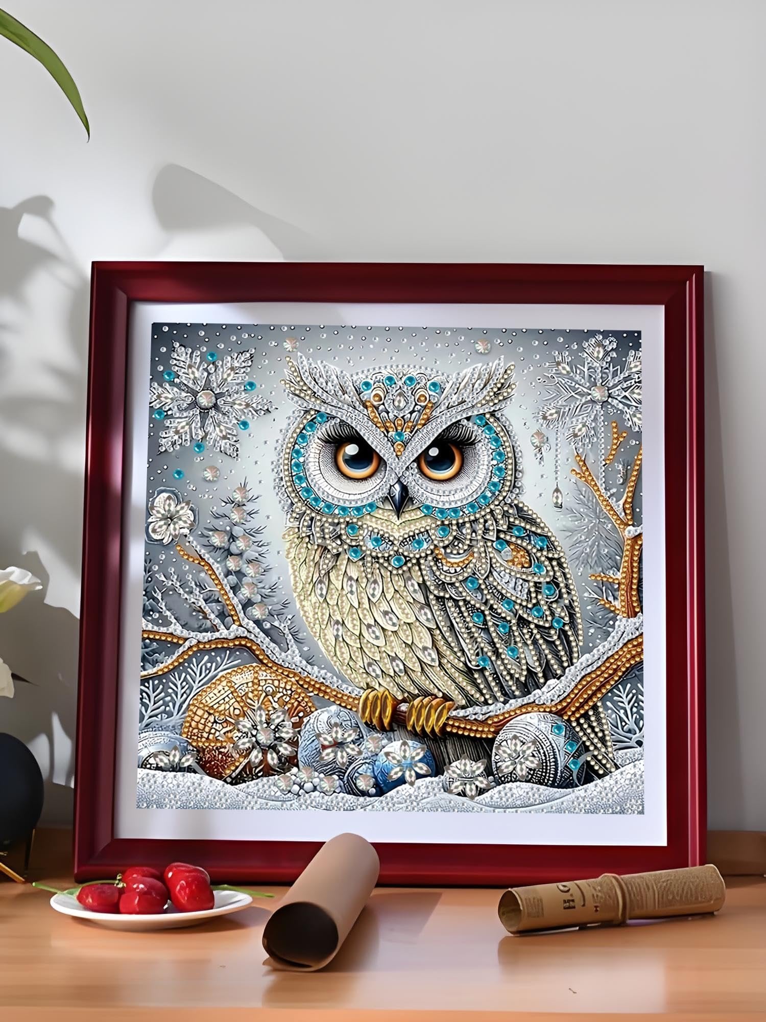 Framed 5D diamond art painting of a detailed owl perched on a snowy branch with snowflakes and ornaments.