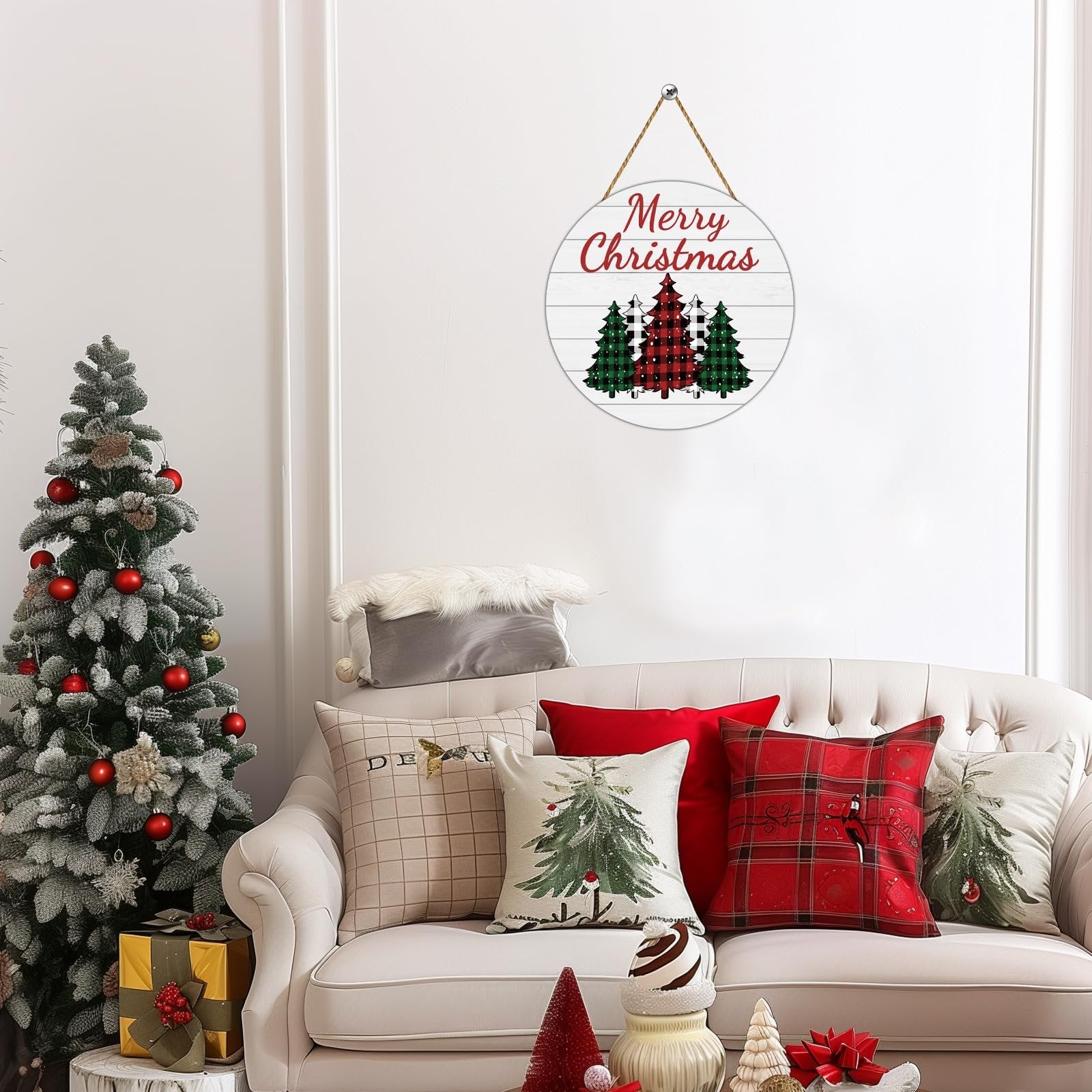 Round buffalo plaid Christmas tree door sign with Merry Christmas text hanging on a wall above a sofa with festive pillows and a Christmas tree.