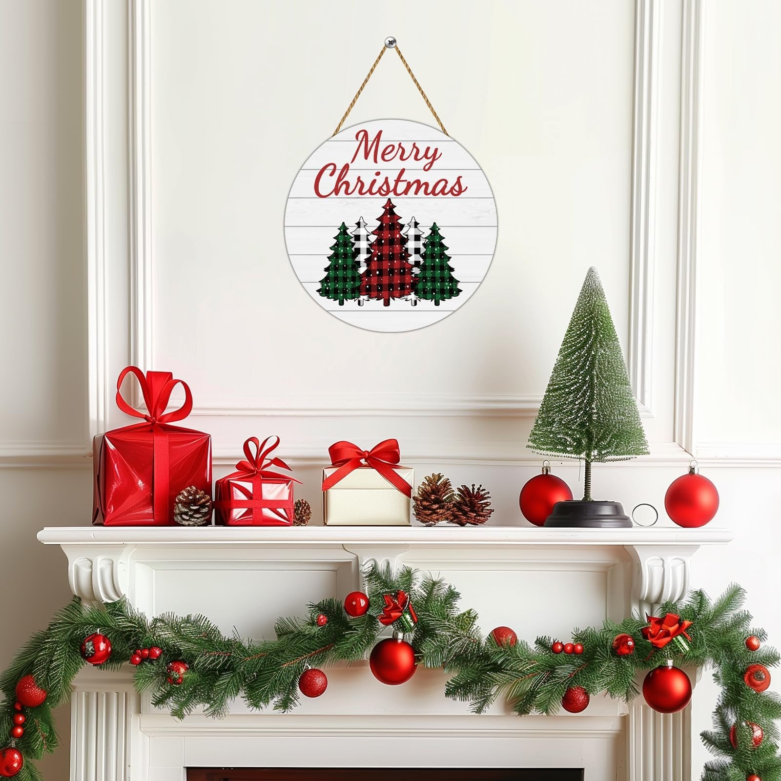 Round buffalo plaid Christmas tree door sign with 'Merry Christmas' text hanging above a fireplace mantel decorated with gifts and garland.