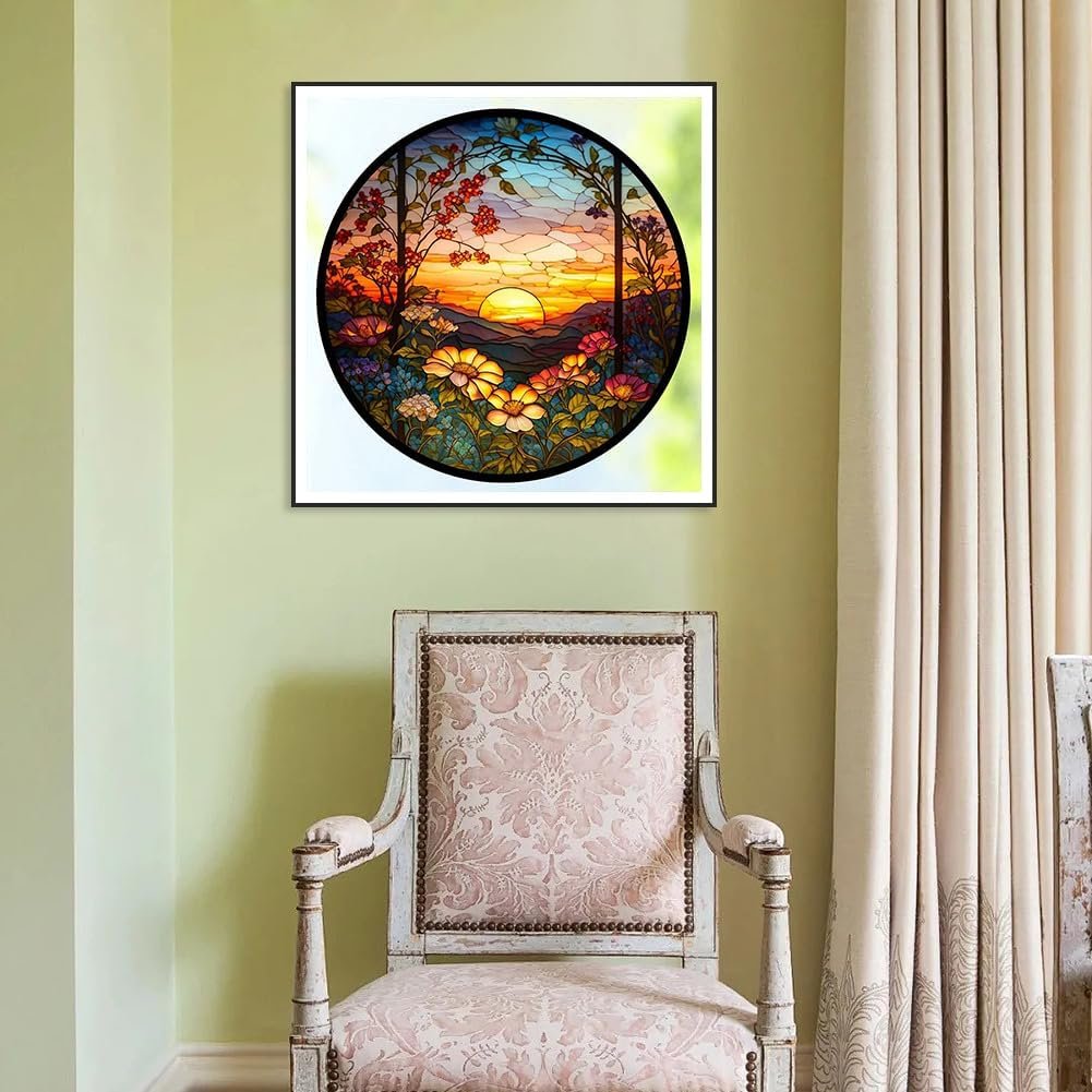 Diamond painting kit featuring a circular stained glass design of a sunset over a floral landscape.