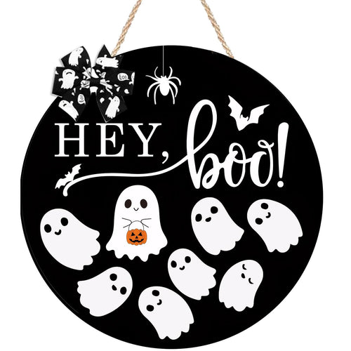 Round black Halloween door sign with 'Hey Boo' text and ghost graphics, topped with a bow and hanging spider.