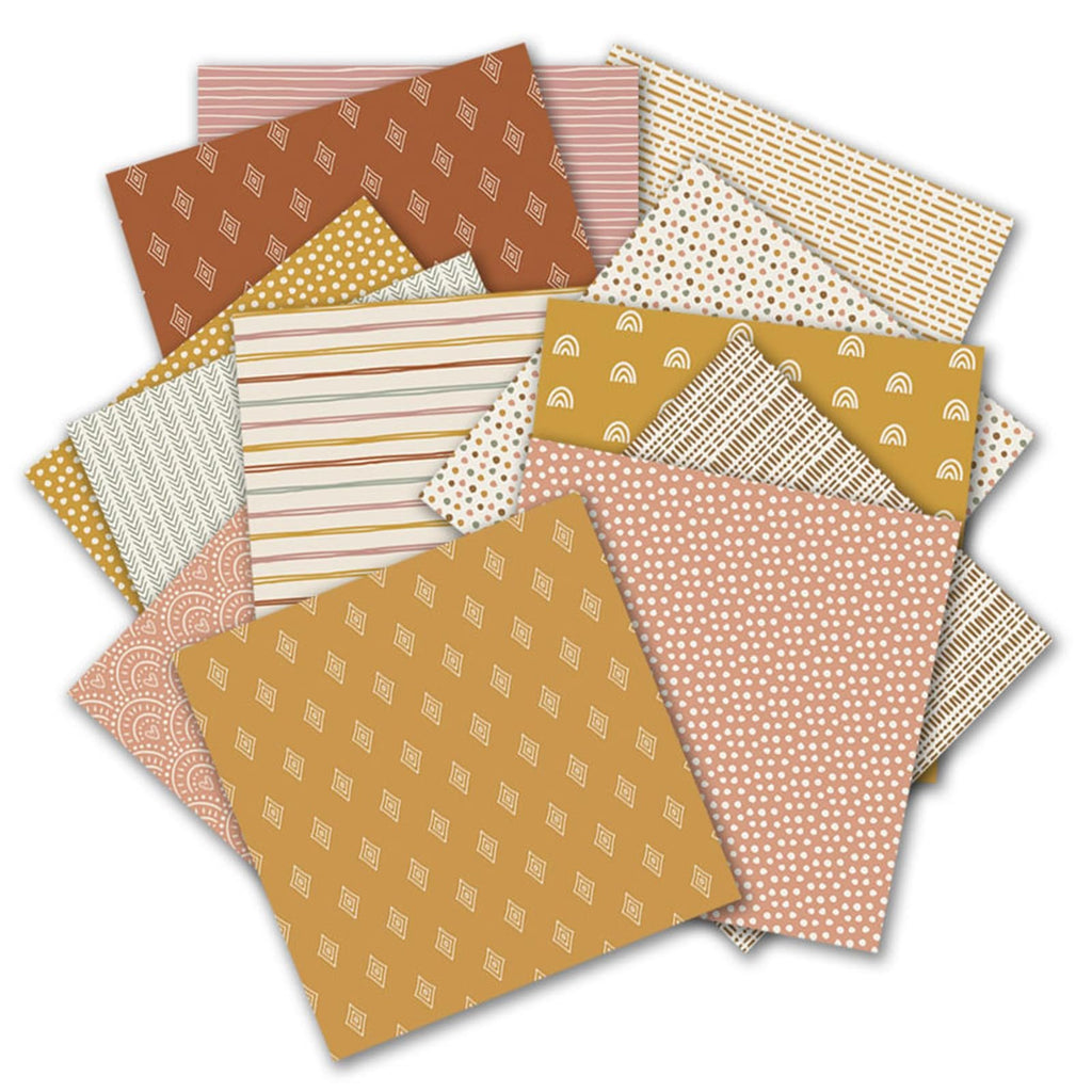 Scrapbook paper pad with 24 sheets of vintage patterns, fanned out on a white background.