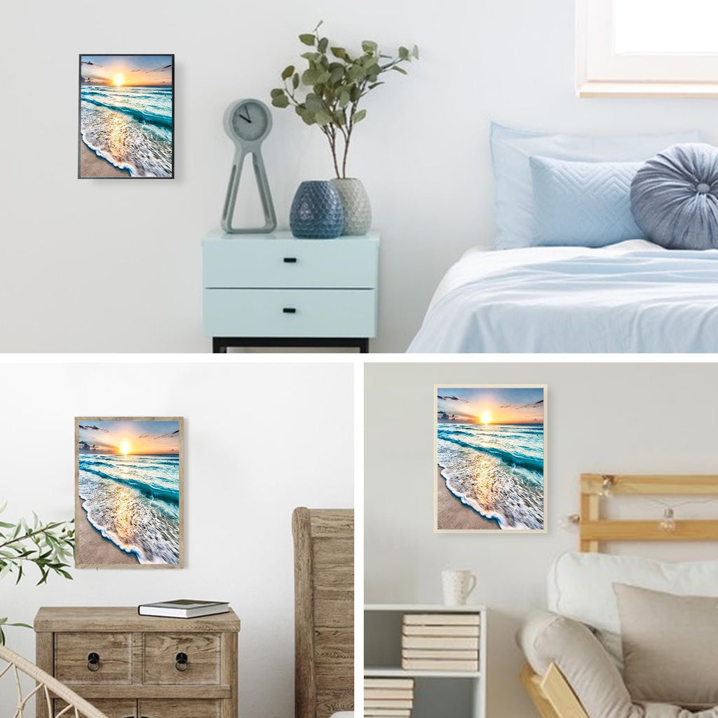 Diamond painting kit with a seaside sunset scene hanging on a wall in a bedroom setting